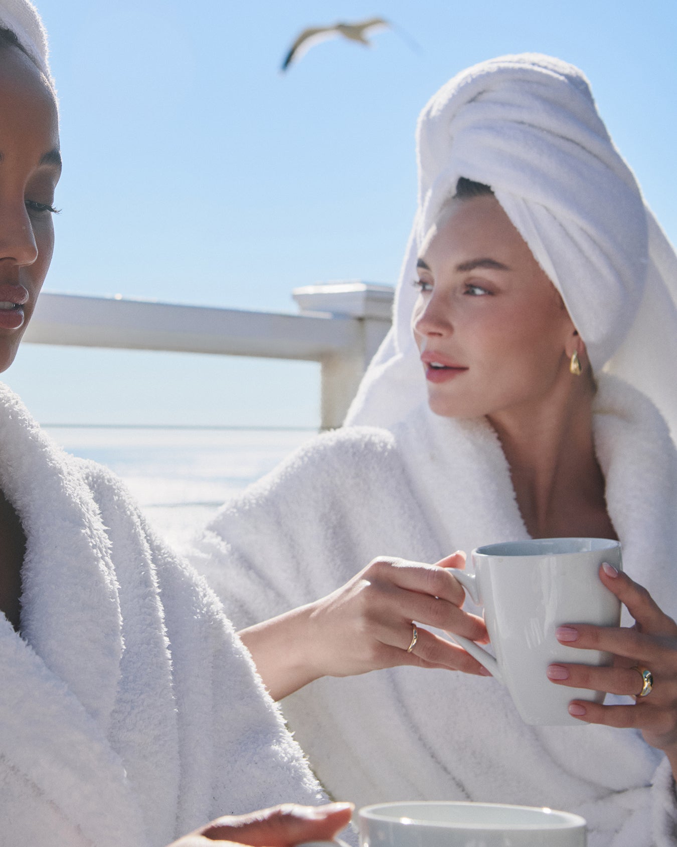 Barefoot dreams white robe in the morning