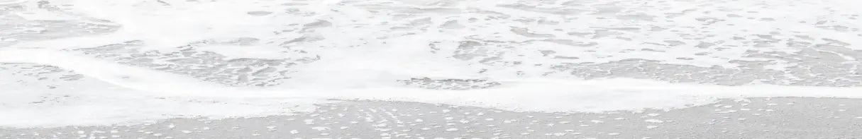 Water foaming at the beach